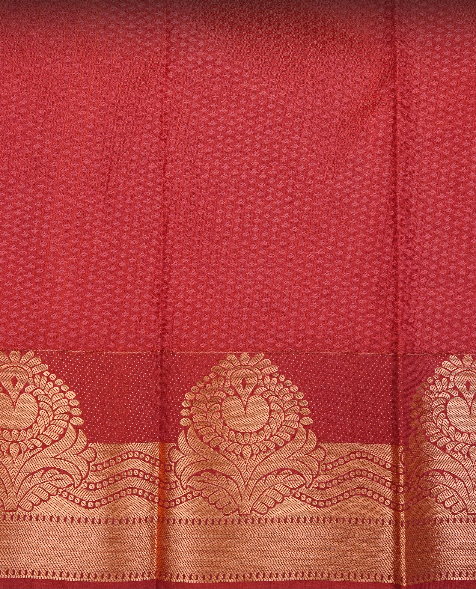 Off white colour Semi silk saree Featuring gold zari motifs on body, complemented by contrast pale orange colour with gold zari border, paired with matching blouse piece.