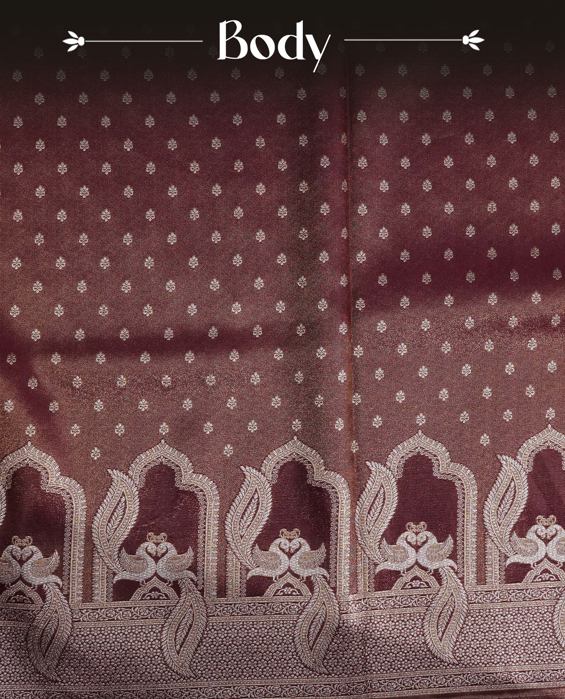 Maroon colour Mulberry silk saree featuring Gold zari buttas on body, complmented by self colour with Gold zari dual peacock in Temple design border, comes with matching blouse piece.