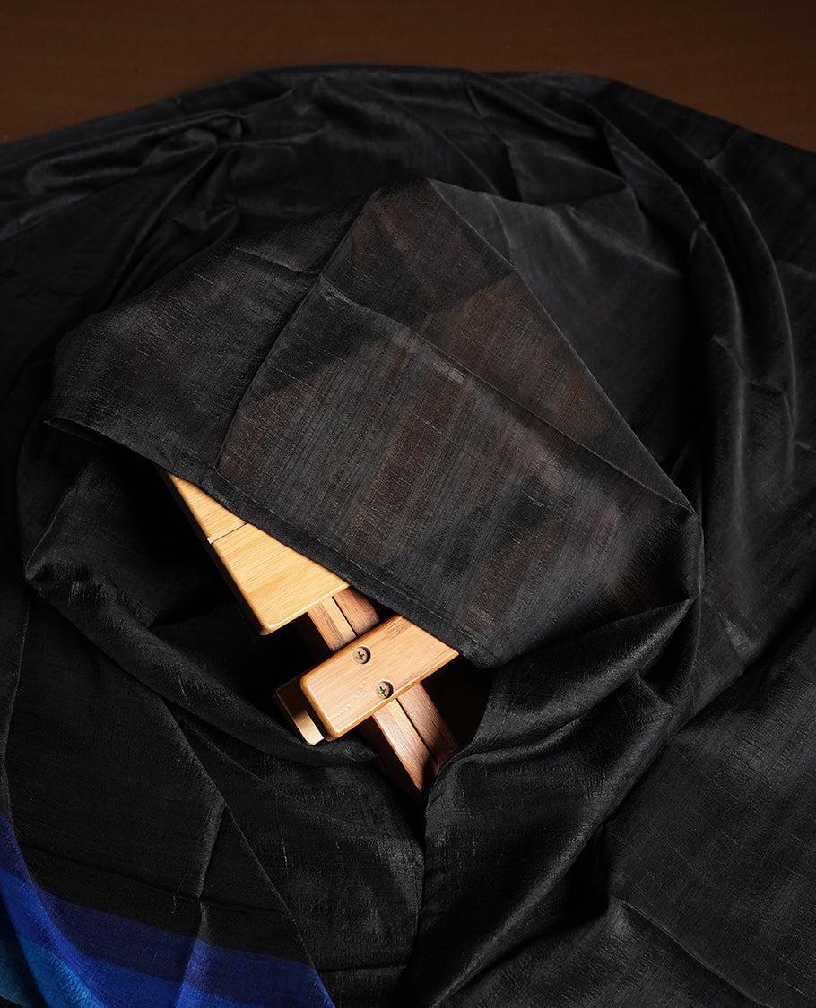 Black colour churidhar material featuring elegant horizontal stripes on the yoke and dupatta, woven in shades of Blue and Black & Paired with a matching plain bottom