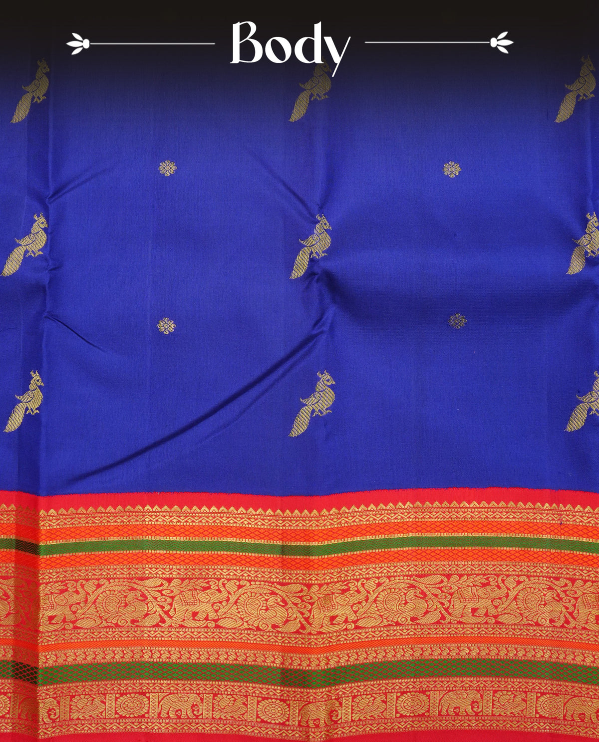 Navy blue colour traditional kancheepuram silk saree featuring Gold zari buttas, contrast multi colour with traditional border, comes with matching blouse piece.