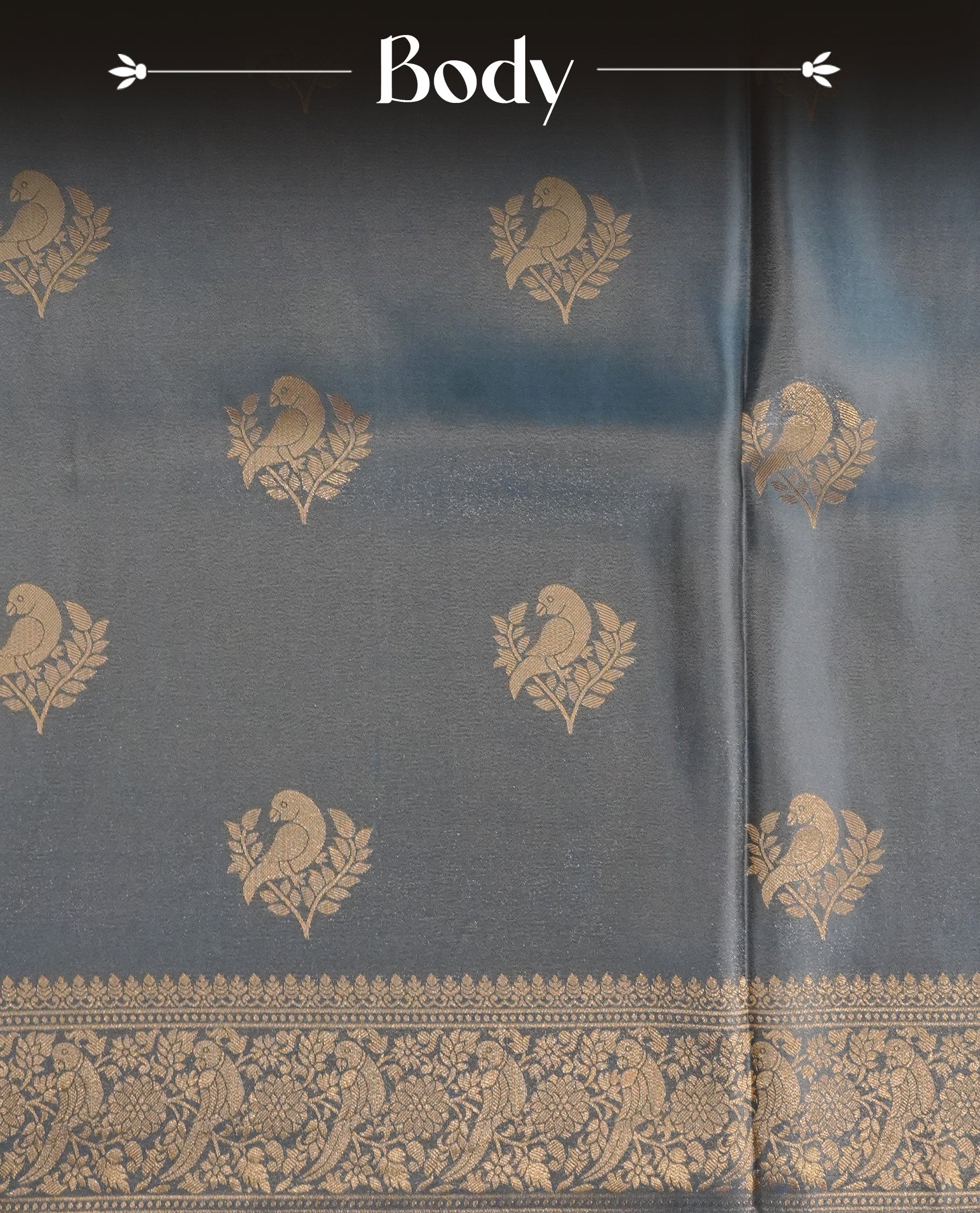 Pastel teal colour Mulberry silk saree featuring Gold zari bird motifs on body, complemented by self colour with gold zari border, comes with matching blouse piece.