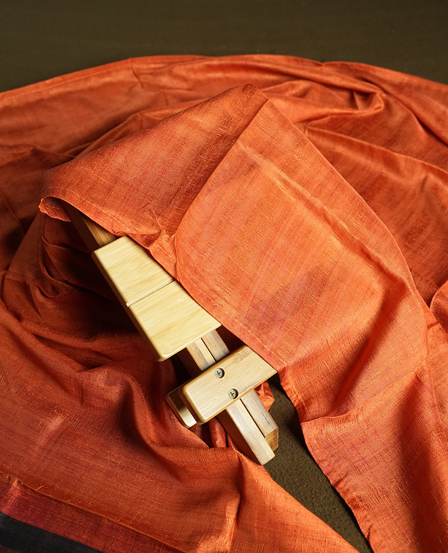 Orange colour churidhar material featuring elegant horizontal stripes on the yoke and dupatta, woven in shades of Brown and Orange & Paired with a matching plain bottom