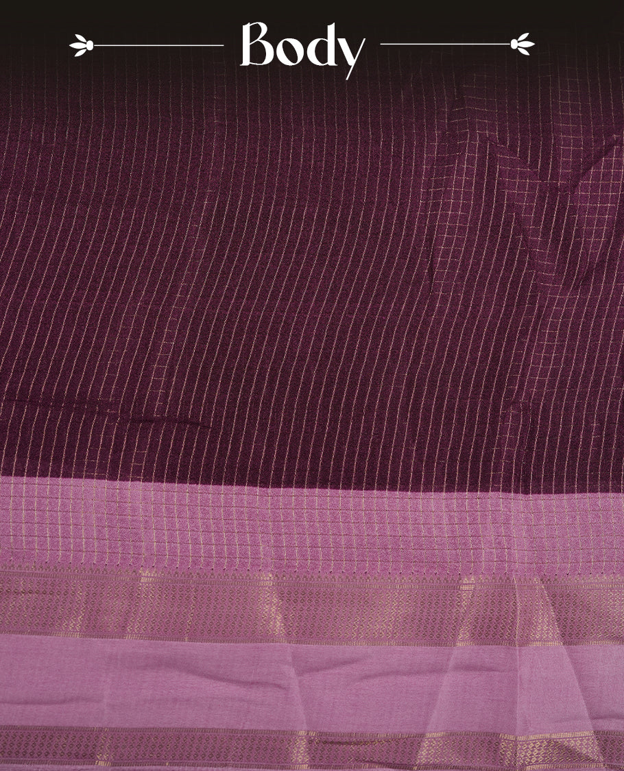 Purple colour saree featuring fine check patterns on the body, paired with contrast pink colour zari woven border and pallu. Comes with a matching blouse piece