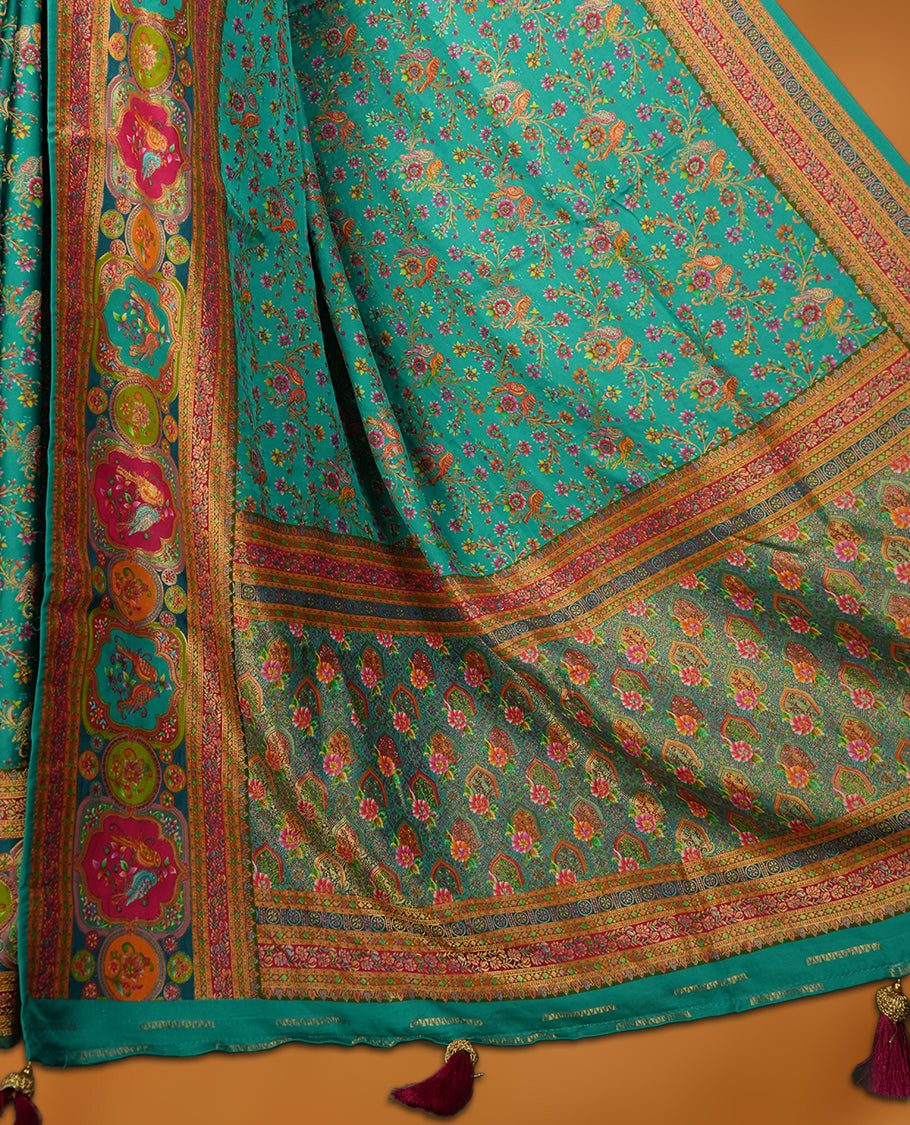 Aqua green colour Pashmina silk saree densely woven with intricate multicolour floral kodi pattern across the body, framed by an opulent arabesque border and grand storytelling pallu, paired with a matching woven border blouse piece