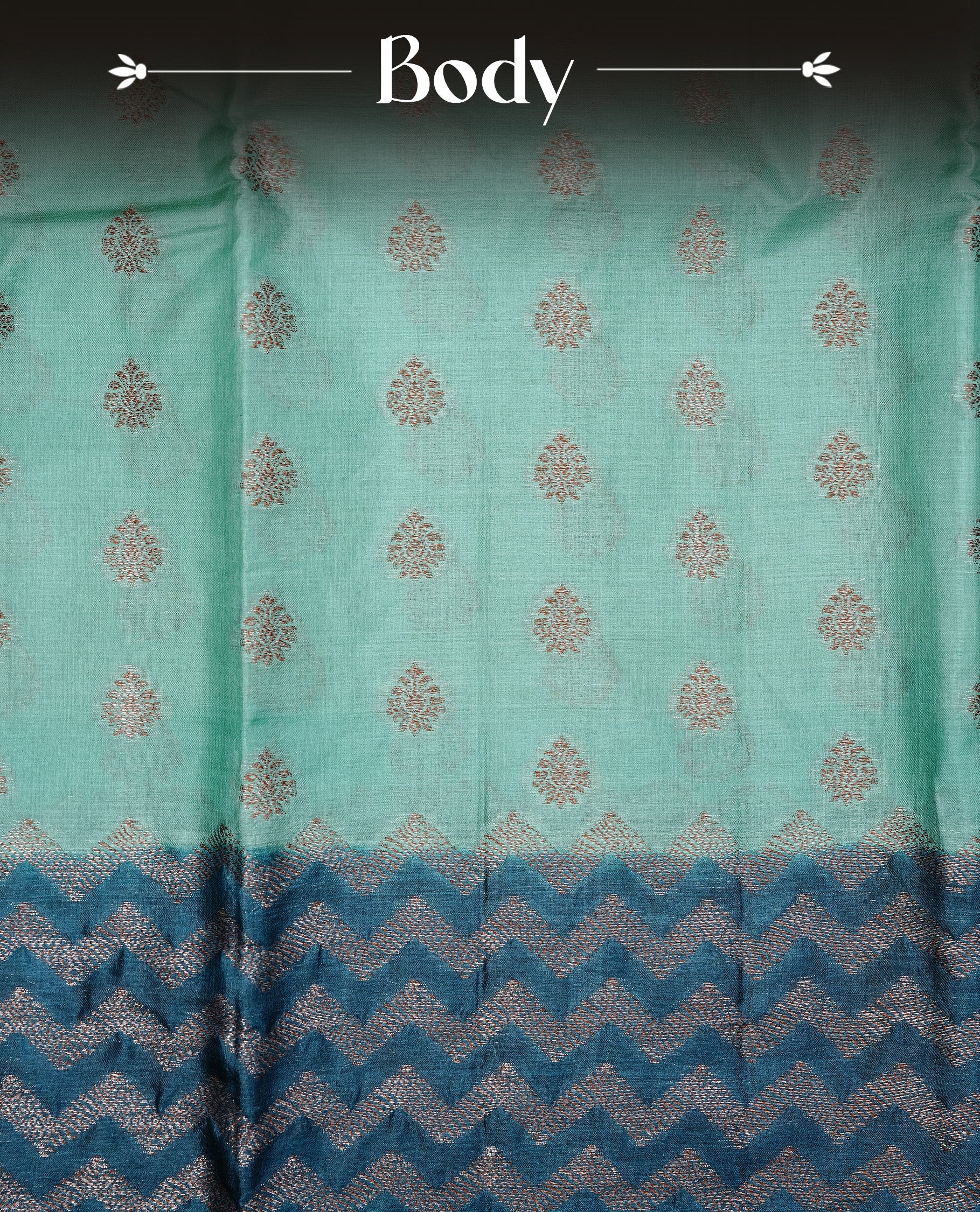Aqua Colour Tussar silk saree featuring Antique Zari motifs on body, Finished with contrast Teal colour Zigzag zari pattern border, paired with matching blouse piece.