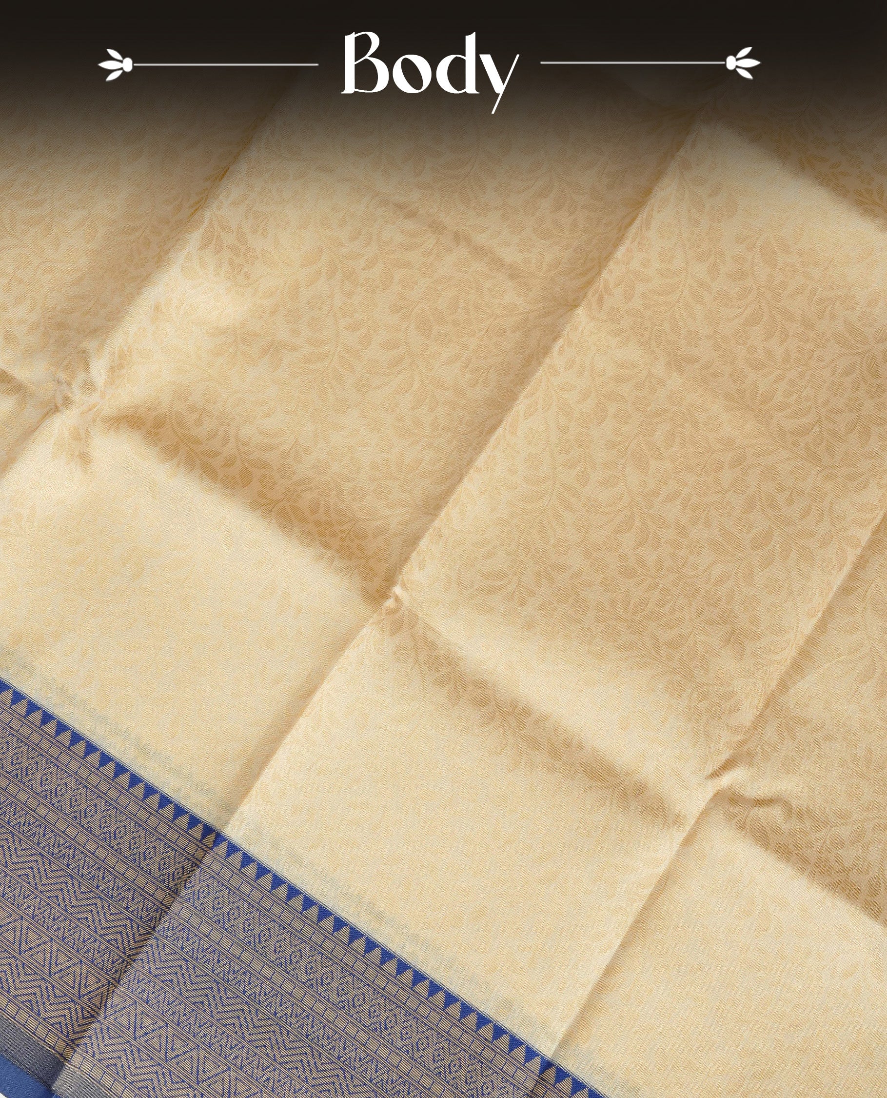 Cream Colour Semi Soft Silk Saree Featuring Gold zari Patter On Body, Highlighted  by contrast Dark Blue border with Gold zari, paired with matching blouse piece.