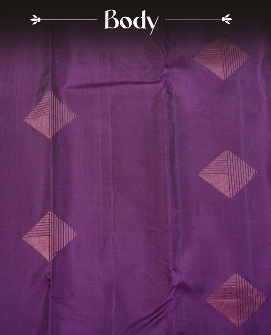 Dark Purple Colour Traditional Kancheepuram Silk Saree Featuring Copper Zari Diamond Motifs on the Body, Designed Without a Border and with a Grand Pallu, Paired with a Matching Blouse.