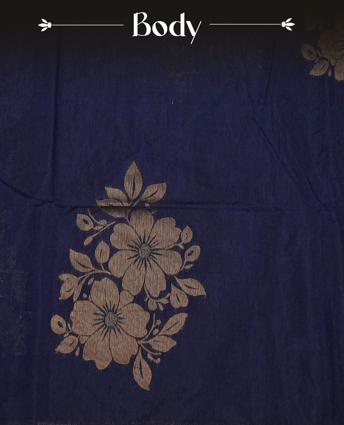 Navy blue colour semi linen saree with elegant gold zari floral motifs across the body, complemented by a contrast peacock green with grand gold zari pallu and a borderless design, paired with a matching blouse piece.