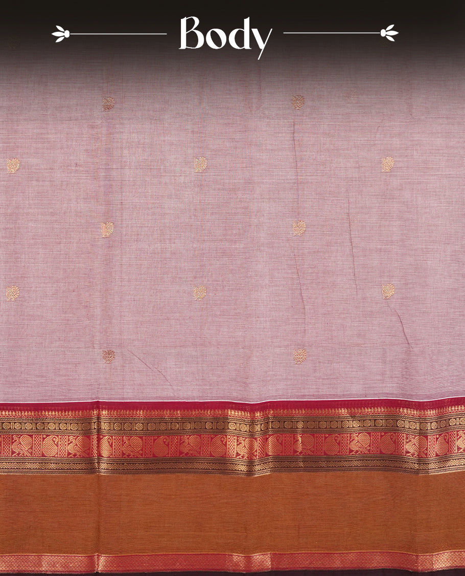 Pastel purple colour Chettinad cotton saree featuring small motifs on the body, highlighted with a rich brown and maroon zari woven border and intricate pallu design & Comes with a matching blouse piece.