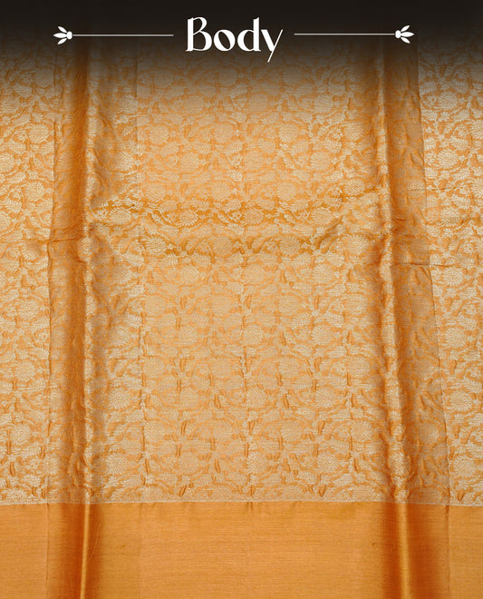 Mustard colour Pure tusser silk saree featuring Gold Zari floral Kodi Work On Body , A Plain  border & Grand  pallu Paired With  a matching blouse piece..