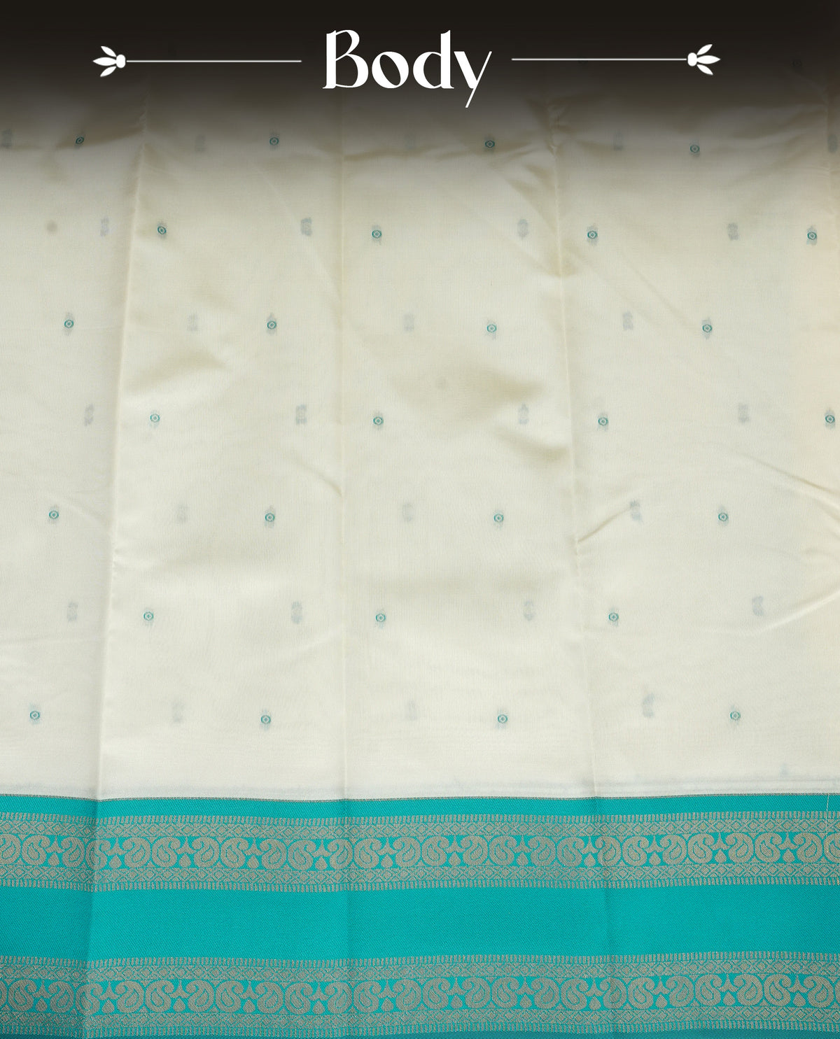 Off White  Colour Semi Silk Saree Featuring  Teal thread buttas On Body, Highlighted  by contrast border with Mango motifs, paired with matching blouse piece.