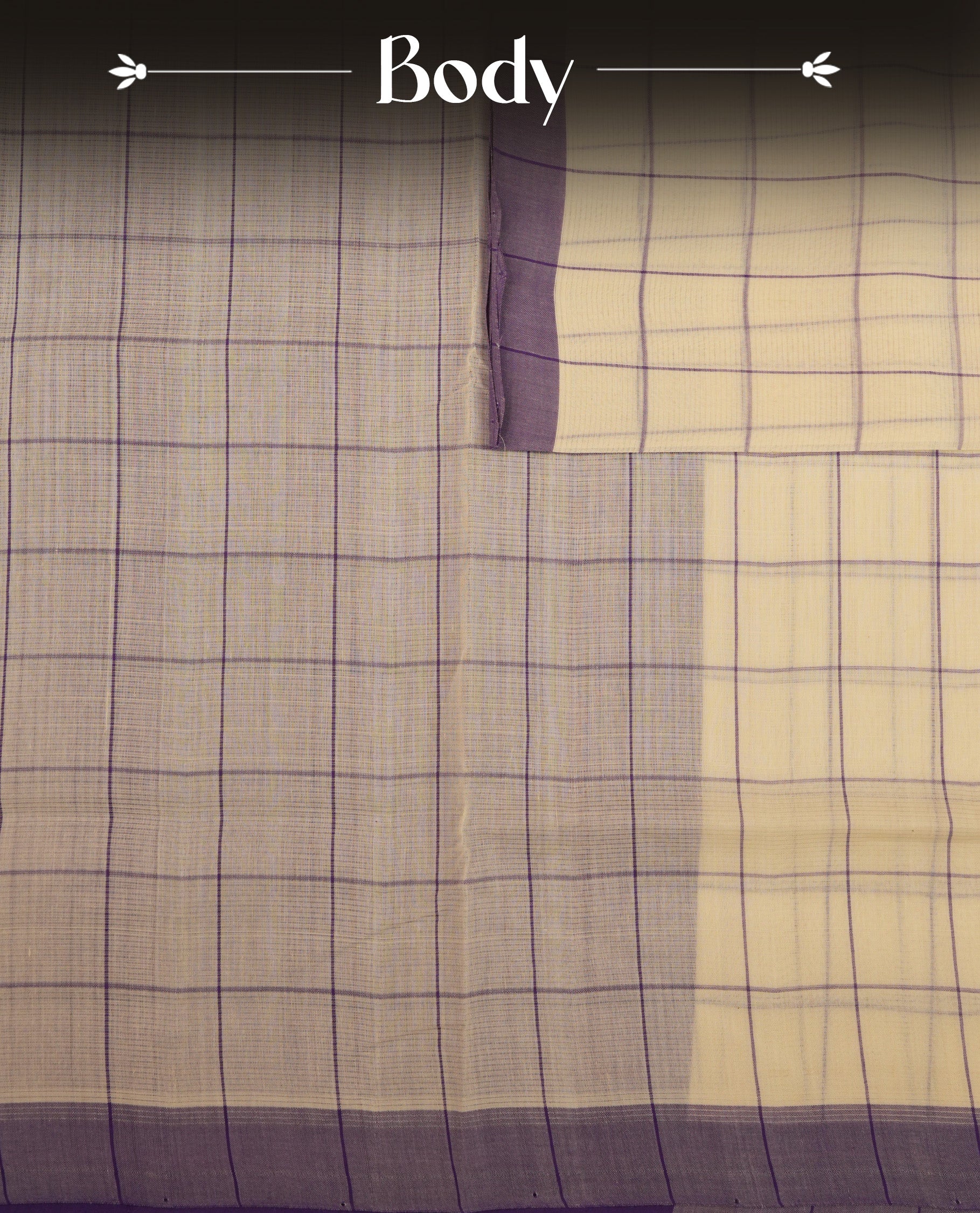 Off-white Mangalagiri cotton saree with delicate lavender checks, a contrast purple border & striped pallu. Paired with a matching blouse piece