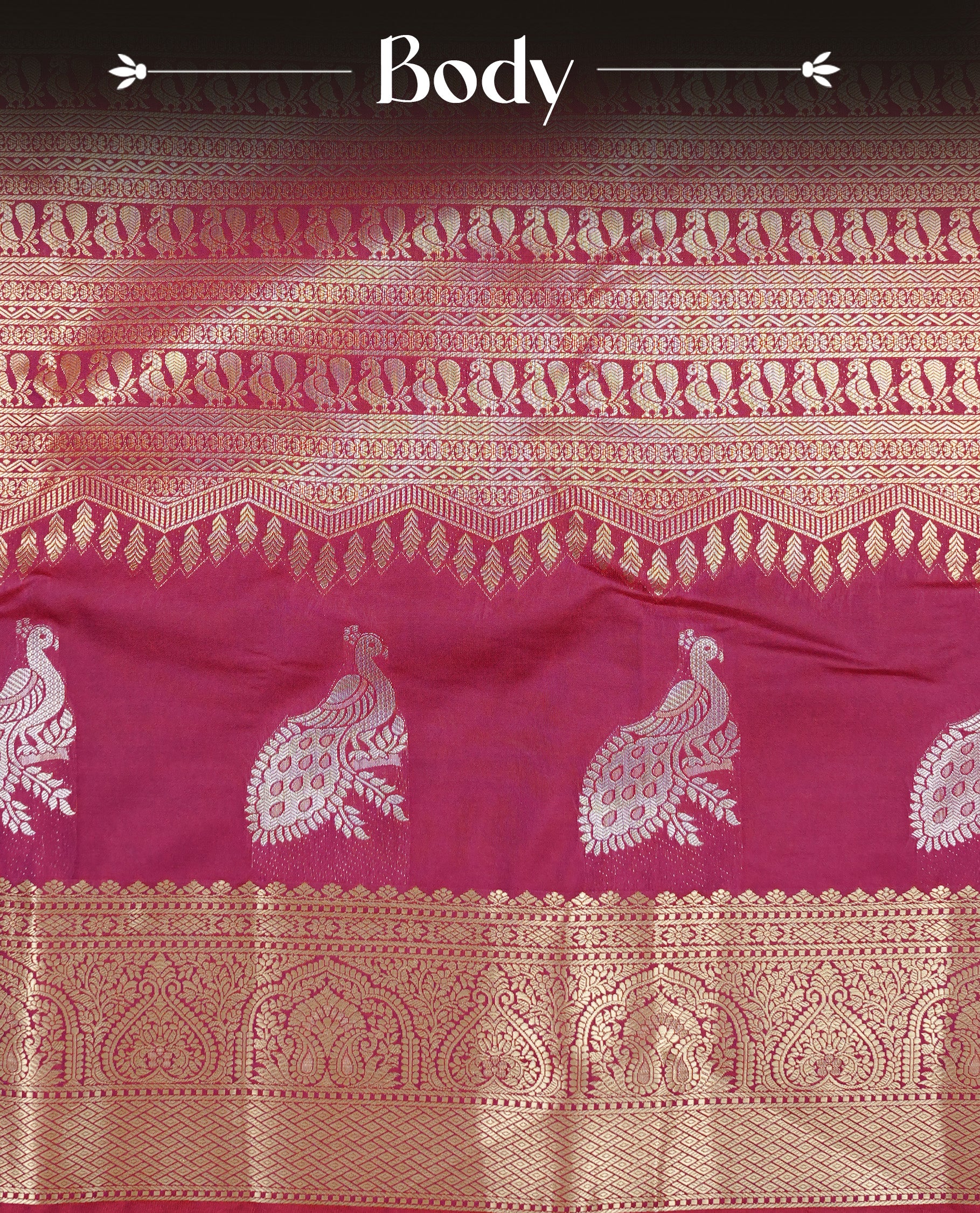 Burgundy colour semi wedding silk saree featuring Gold zari pattern on body, complemented Silver Peacock motifs & gold zari border, paired with matching blouse piece.