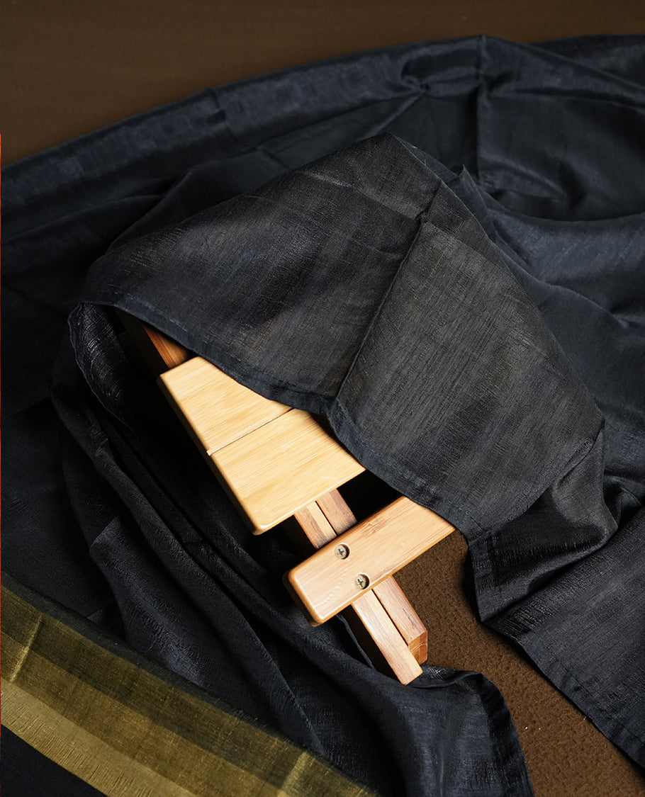 Black colour churidhar material featuring elegant horizontal stripes on the yoke and dupatta, woven in shades of Green and Black & Paired with a matching plain bottom