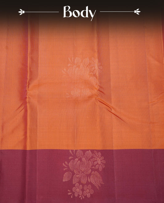 Rust Orange  Colour Traditional Kancheepuram Silk Saree Featuring Copper Zari Floral Motifs on the Body, Designed With a Copper Zari Maroon Border and with a Grand Maroon Pallu, Paired with a Matching Blouse.