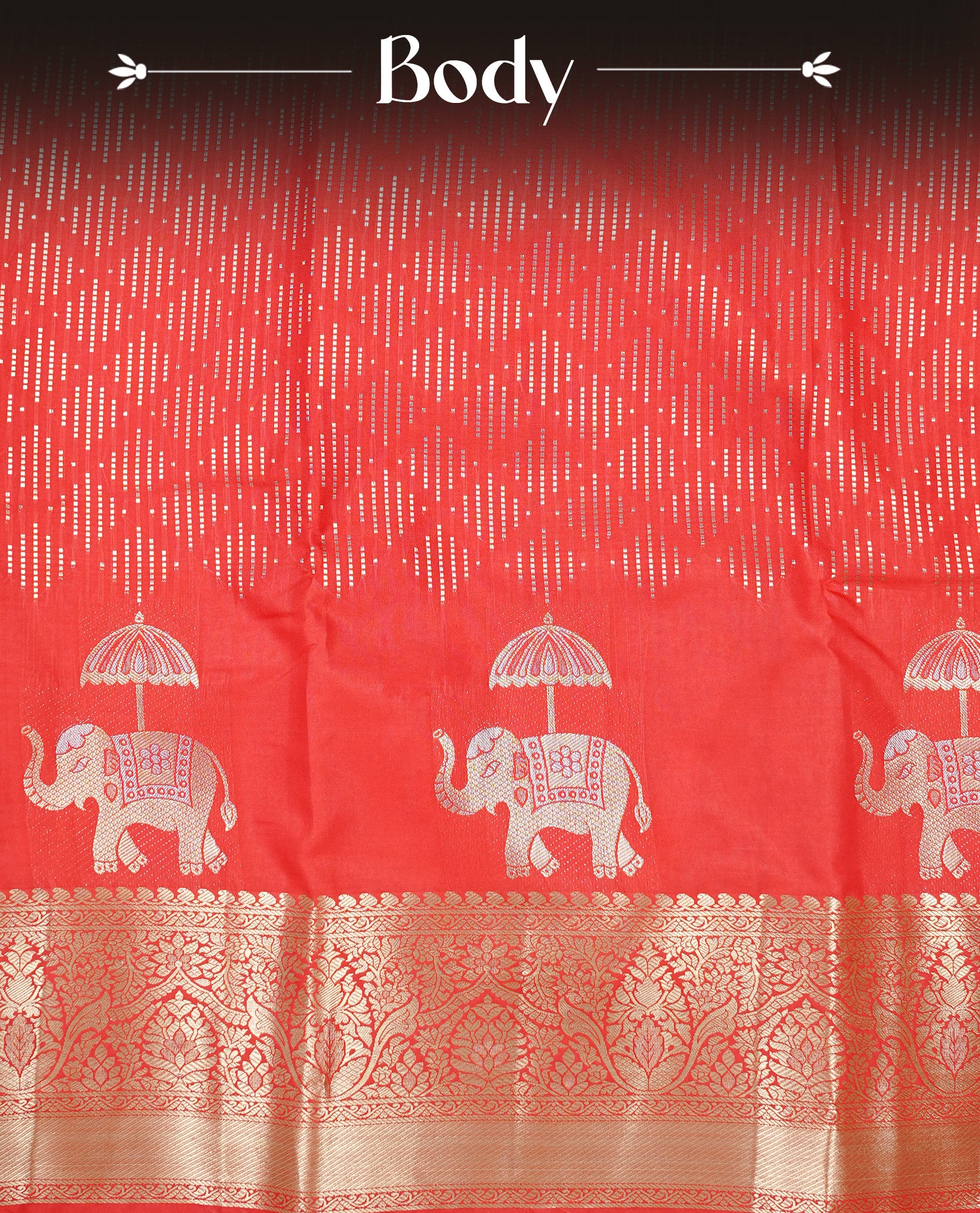 Red colour semi wedding silk saree featuring Gold zari pattern on body, complemented Silver Elephant motifs & gold zari border, paired with matching blouse piece.