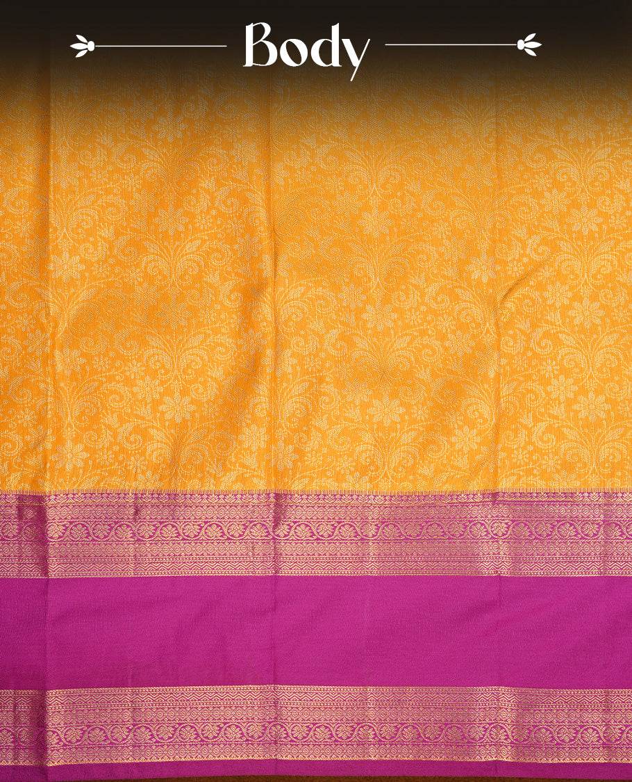 Yellow colour semi wedding saree featuring gold zari floral kode pattern on body, contrast Purple colour with traditional border, paired with matching blouse piece.