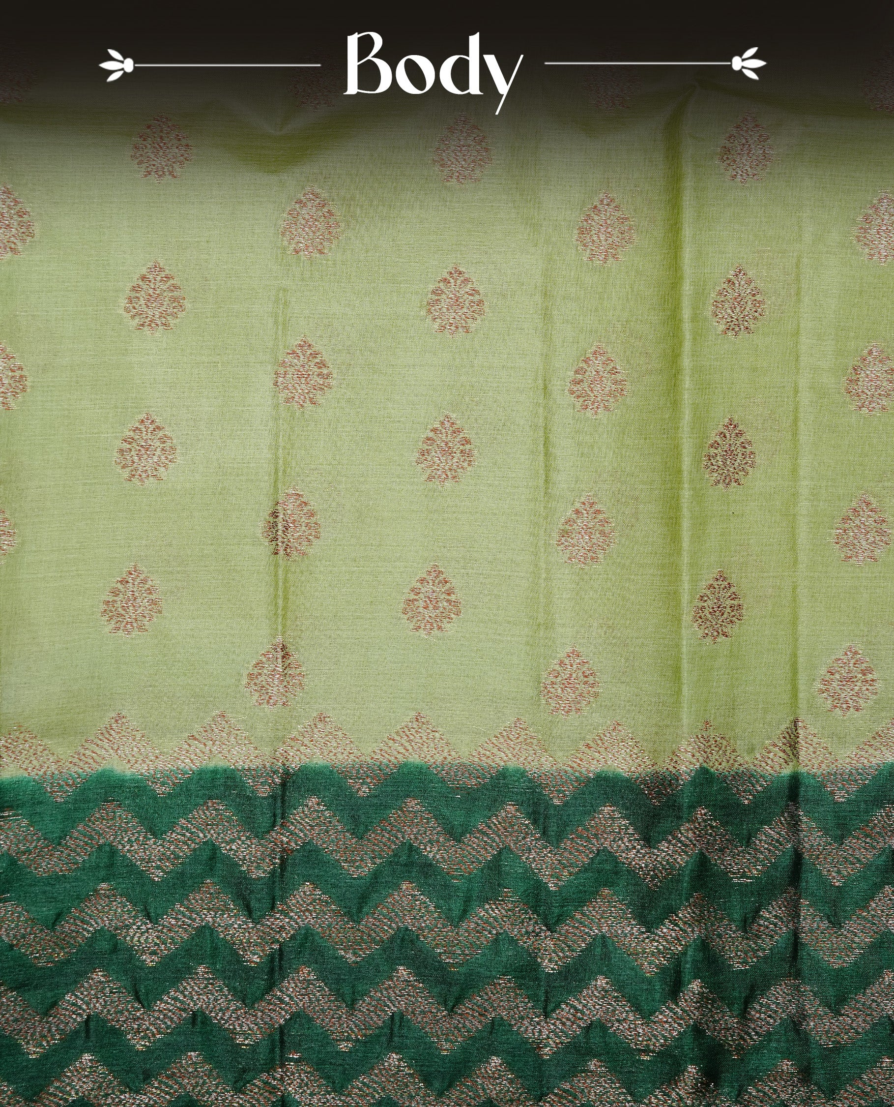 Pastel Green Colour Tussar silk saree featuring Antique Zari motifs on body, Finished with contrast Green colour Zigzag zari pattern border, paired with matching blouse piece.