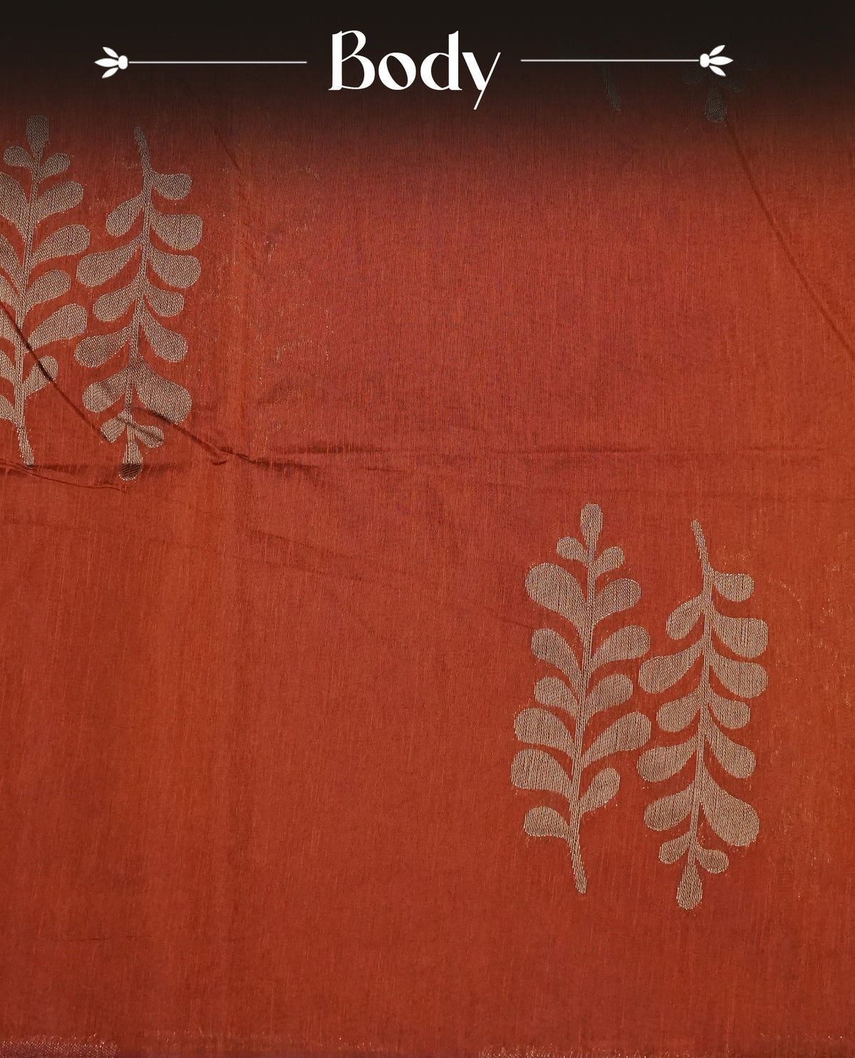 Rust orange colour semi linen saree with elegant gold zari leaf motifs across the body, complemented by a rich wine purple contrast pallu with intricate gold zari  works and a borderless design, paired with a matching blouse piece.