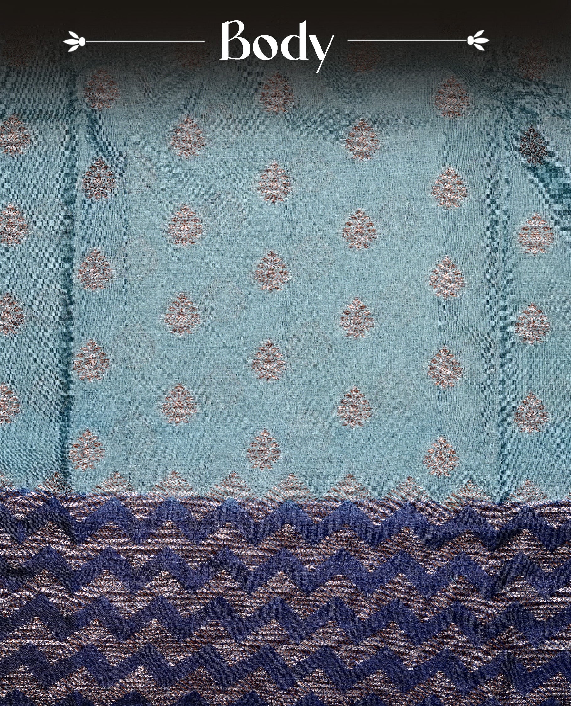 Aqua Blue Colour Tussar silk saree featuring Antique Zari motifs on body, Finished with contrast Blue colour Zigzag zari pattern border, paired with matching blouse piece.