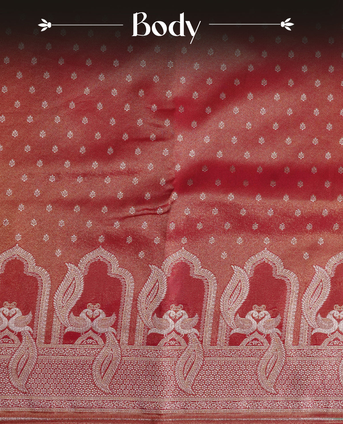 Red colour Mulberry silk saree featuring Gold zari buttas on body, complmented by self colour with Gold zari dual peacock in Temple design border, comes with matching blouse piece.