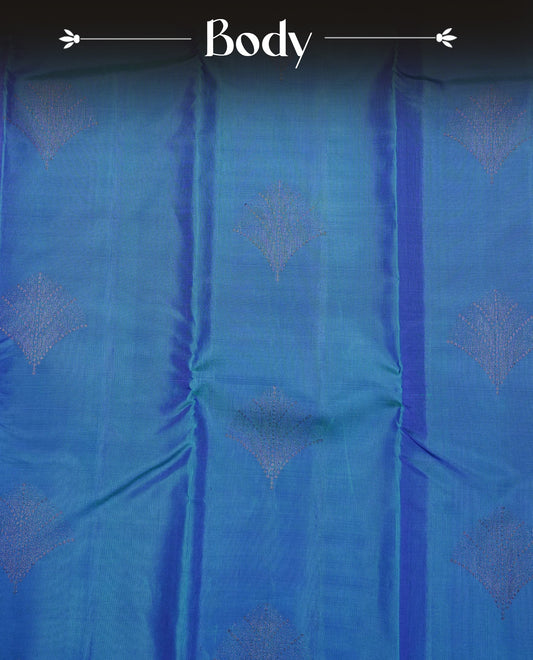 Peacock Blue  colour soft silk saree featuring  Leaf Motifs on body, complemented by contrast with Leaf Motifs  border, paired with matching blouse piece.