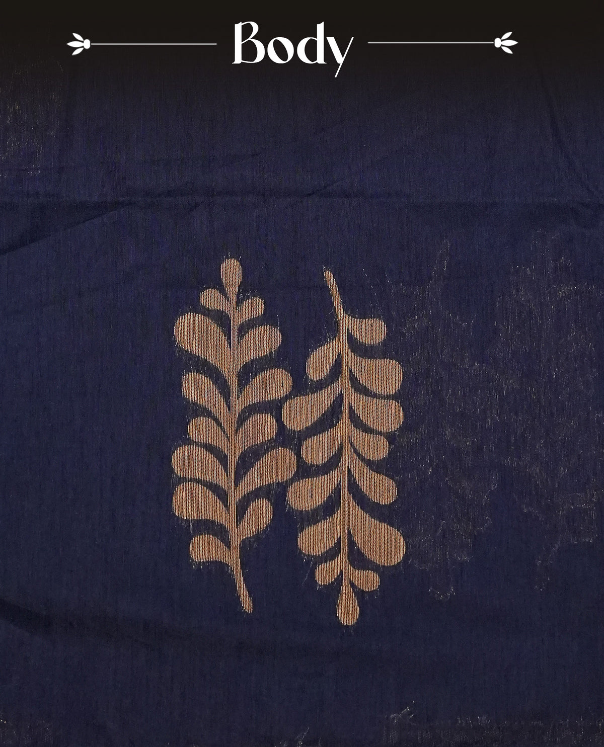 Navy blue colour semi linen saree with elegant gold zari leaf motifs across the body, complemented by a contrast peacock green pallu and a borderless design, paired with a matching blouse piece.