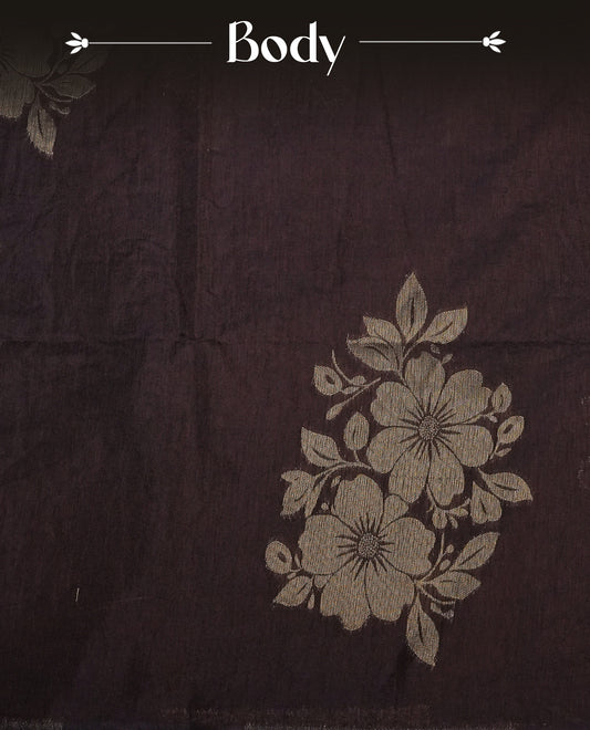 Dark brown  colour semi linen saree with elegant gold zari floral motifs across the body, complemented by a contrast  colour with grand gold zari pallu and a borderless design, paired with a matching blouse piece.