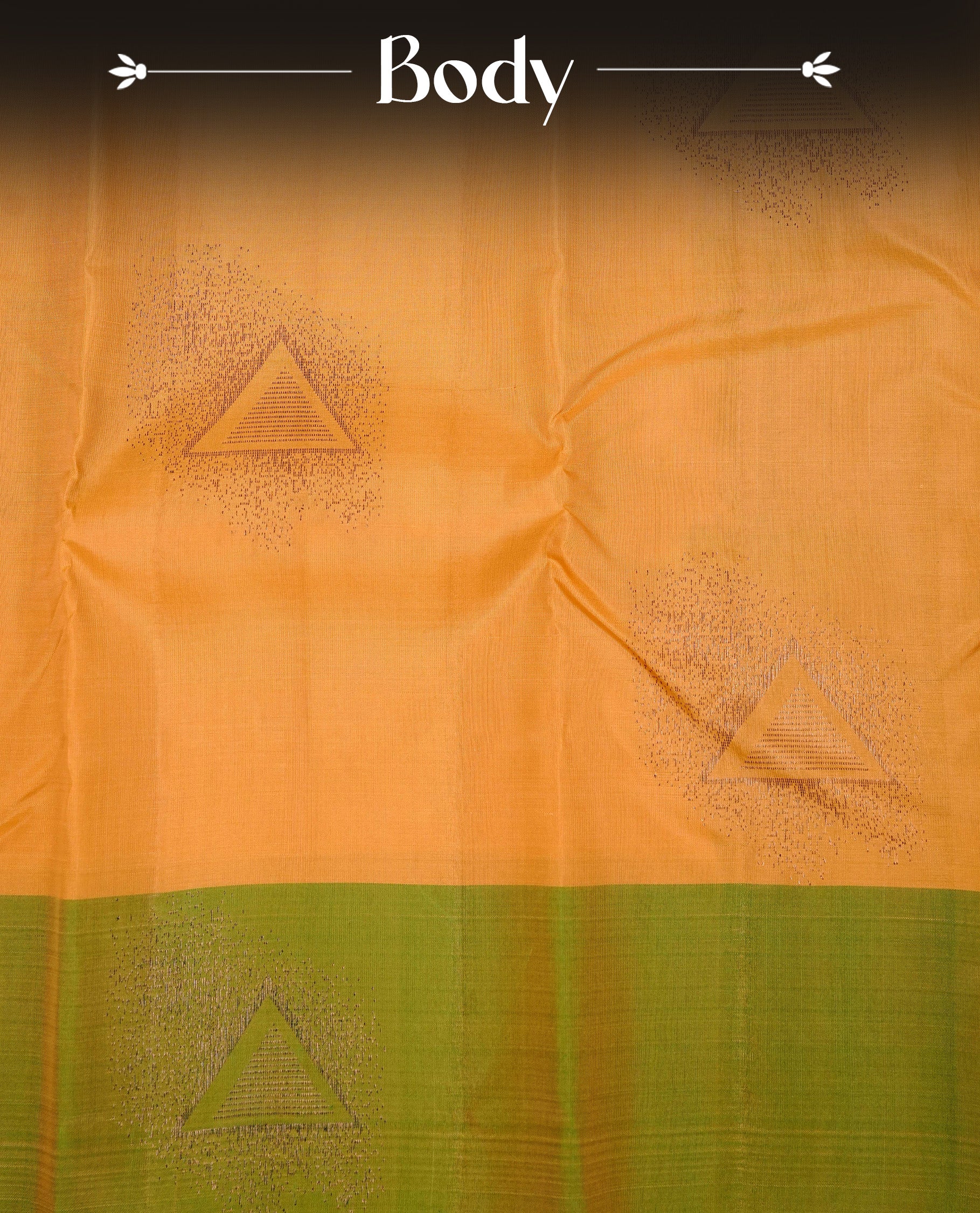 Mustard Colour Traditional Kancheepuram Silk Saree Featuring Bronze Zari Triangle Motifs on the Body, Designed With a Green Border and with a Grand Pallu, Paired with a Matching Blouse.