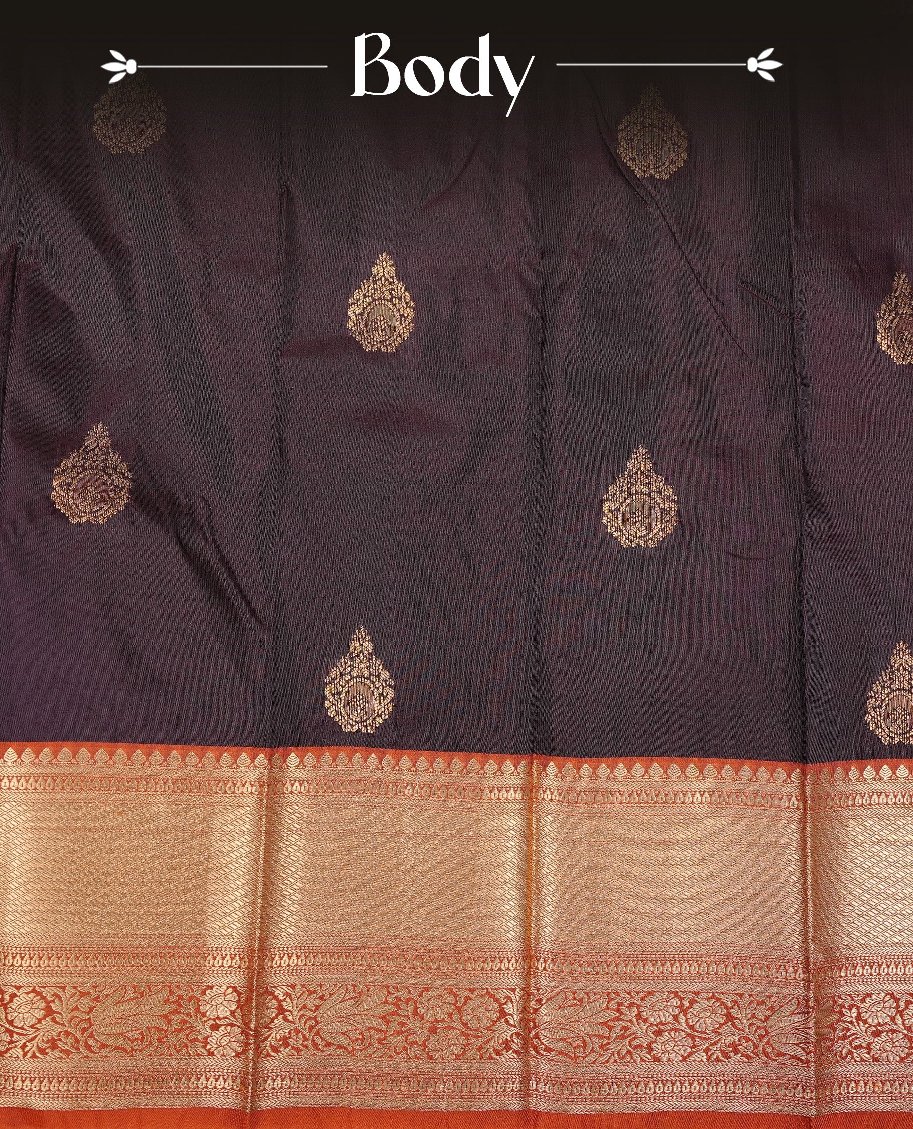 Dark chocolate colour Semi silk saree Featuring gold zari motifs on body, complemented by contrast Orange colour with gold zari border, paired with matching blouse piece.