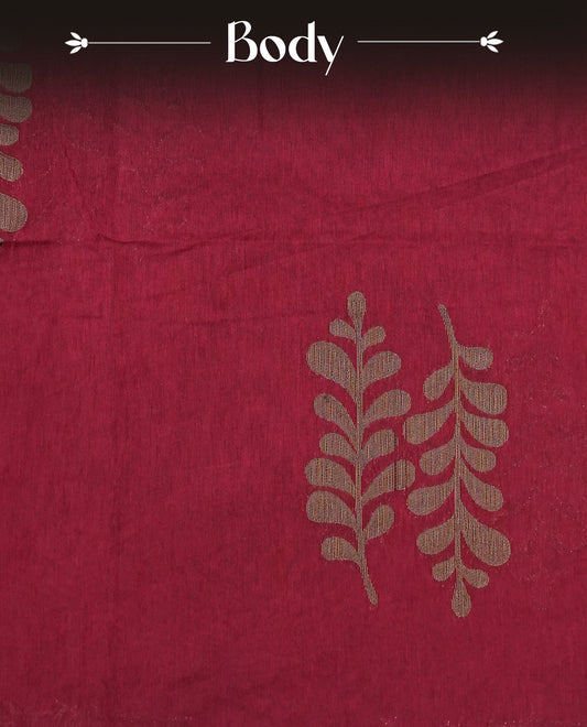 Dark Red colour semi linen saree with elegant gold zari Leaf motifs across the body, complemented by a contrast green colour with grand gold zari pallu and a borderless design, paired with a matching blouse piece.