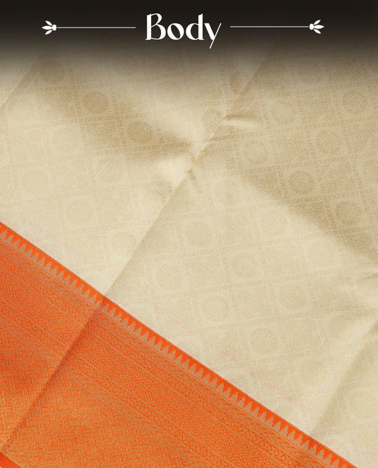 Cream Colour Semi Soft Silk Saree Featuring Gold zari Box With motifs Pattern On Body, Highlighted  by contrast Orange border with Gold zari, paired with matching blouse piece.