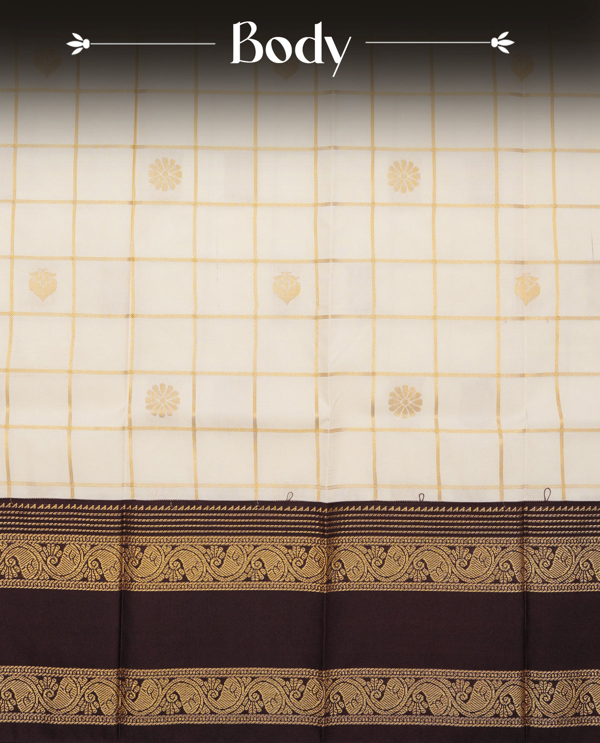 Cream colour soft silk saree featuring gold zari check pattern with floral mottifs on body, contrast dark brown colour gold zari traditional border, grand pallu comes with matching blouse piece.
