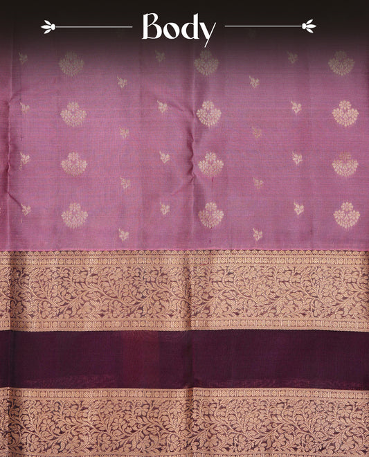 Onion pink colour Traditional Kancheepuram Silk Saree with Elegant Gold Zari Buttas on the Body, Enhanced with a Contrast Wine Colour  with Gold Zari Border and Rich Pallu, Paired with a Matching Blouse Piece.