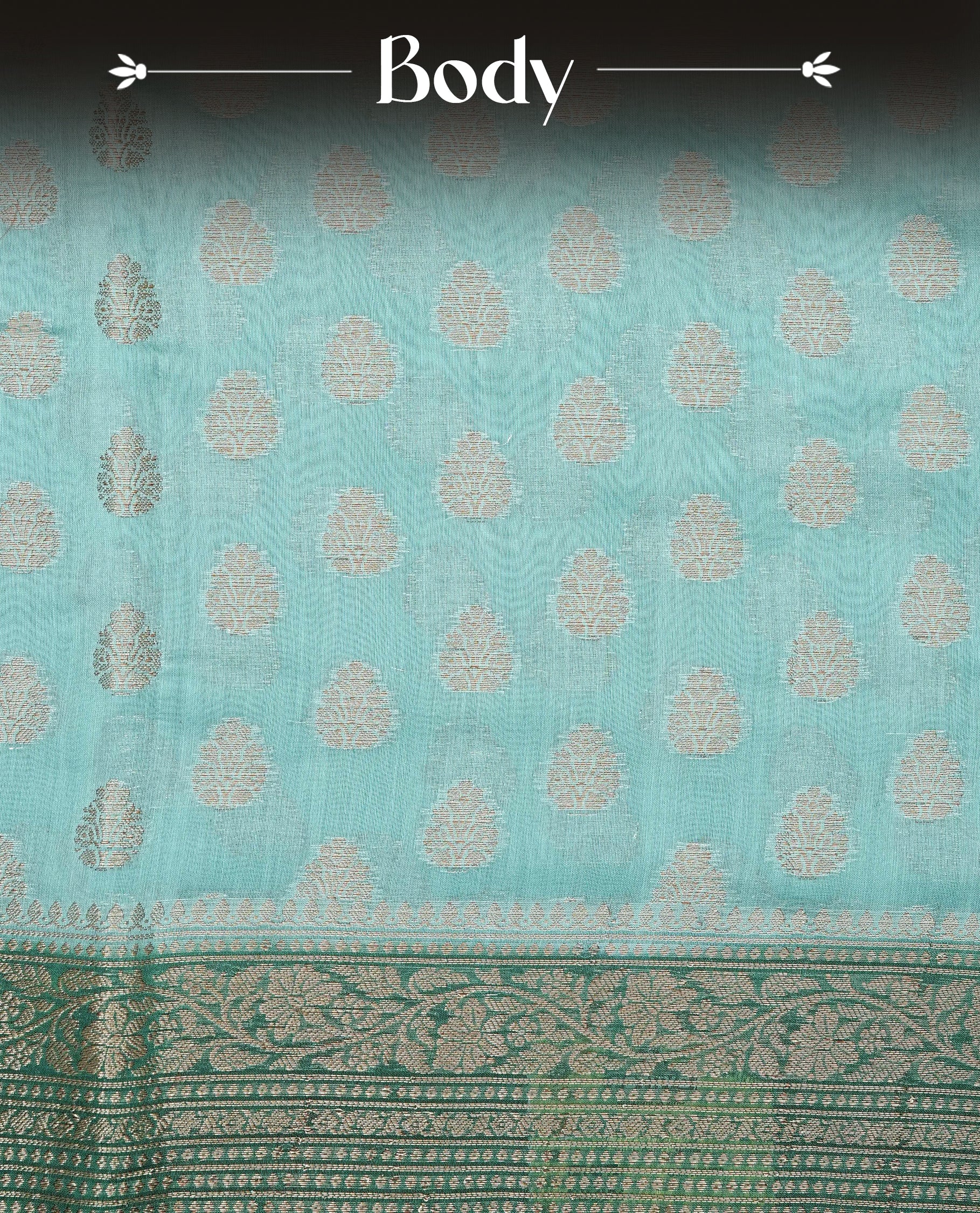 Light Sea Green Colour Tussar Silk saree adorned with antique zari butta motifs across the body, complemented by a contrasting bottle green floral zari border and pallu, paired with a matching blouse piece.