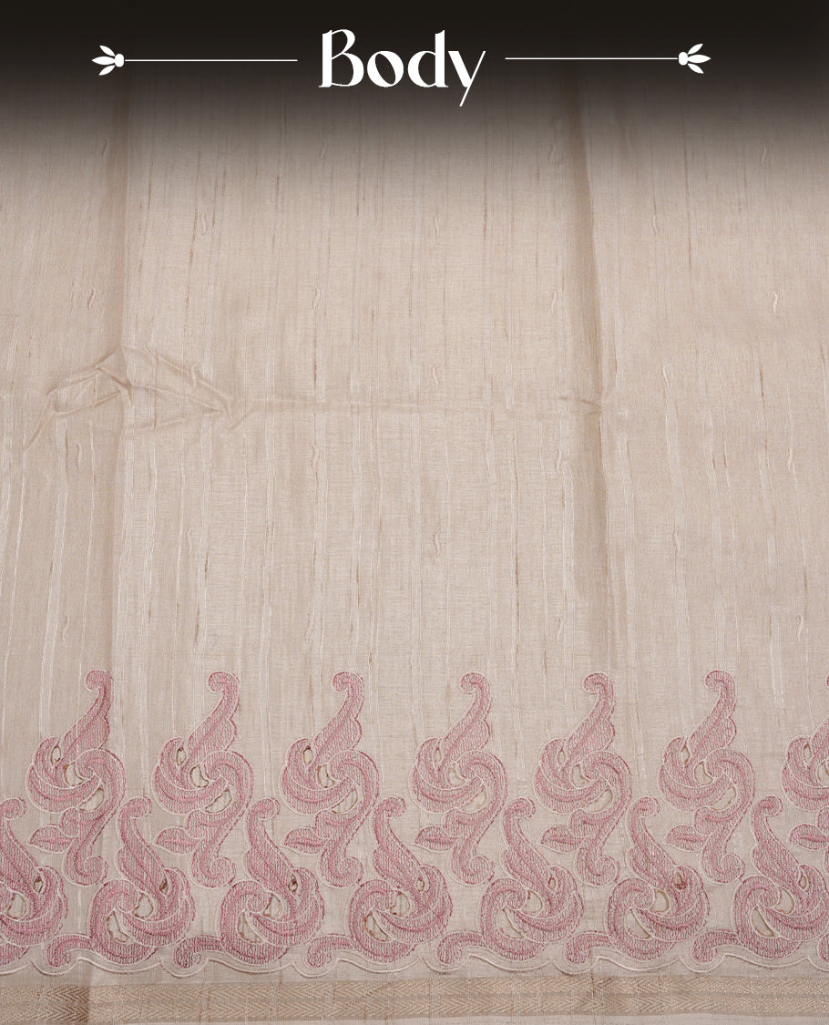 Beige colour Tussar silk saree featuring Elegant plain body, highlighting Purple colour cut work with gold zari border, pallu and paired with matching blouse piece.