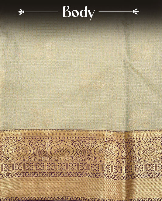 Light Green Colour Semi Tissue Silk Saree featuring Gold Zari Checks with elephant & peacock buttas on the body, complemented by an intricately woven gold zari pallu, a rich Purple and gold zari border, and paired with a matching plain blouse piece