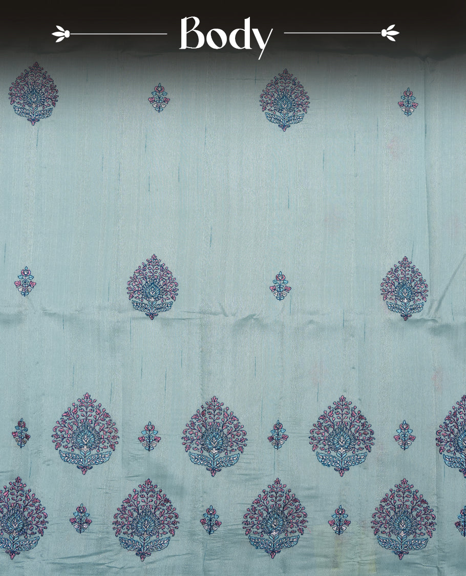 Light blue colour semi tusser silk saree featuring Floral thread embroidery across body, without border and paired with matching blouse.