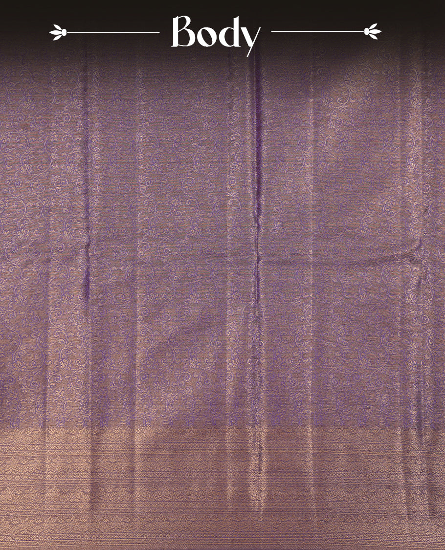 Purple & Gold colour semi tissue silk saree featuring gold zari pattern on body, self colour with gold zari traditional border, paired with matching blouse piece.