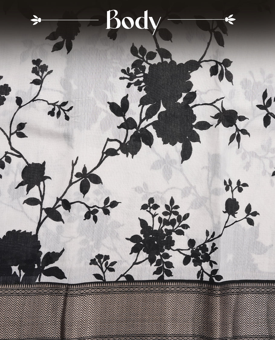 Off White colour Viscos semi printed saree featuring a light golden zari border, abstract black printed motifs on the body, and comes with a matching blouse