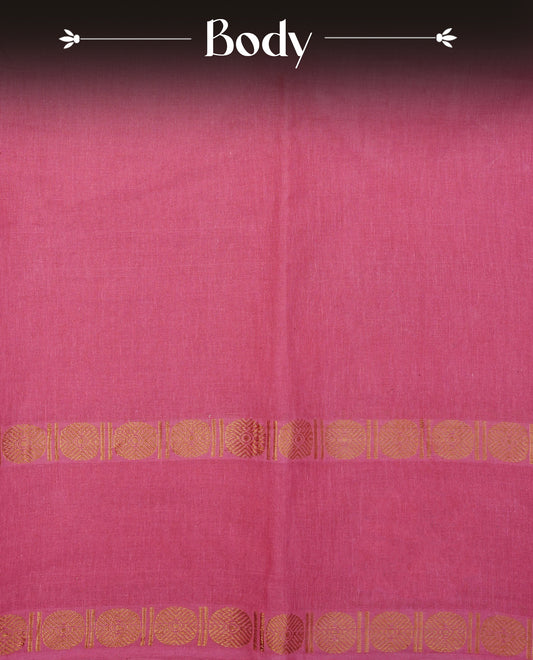 Pink  Colour  Sungudi Cotton Saree with gold zari motifs on the body, a matching gold zari border, and a plain pallu. Paired with a contrast Dark Chocolate Brown colour  blouse piece  featuring a gold zari peacock border.