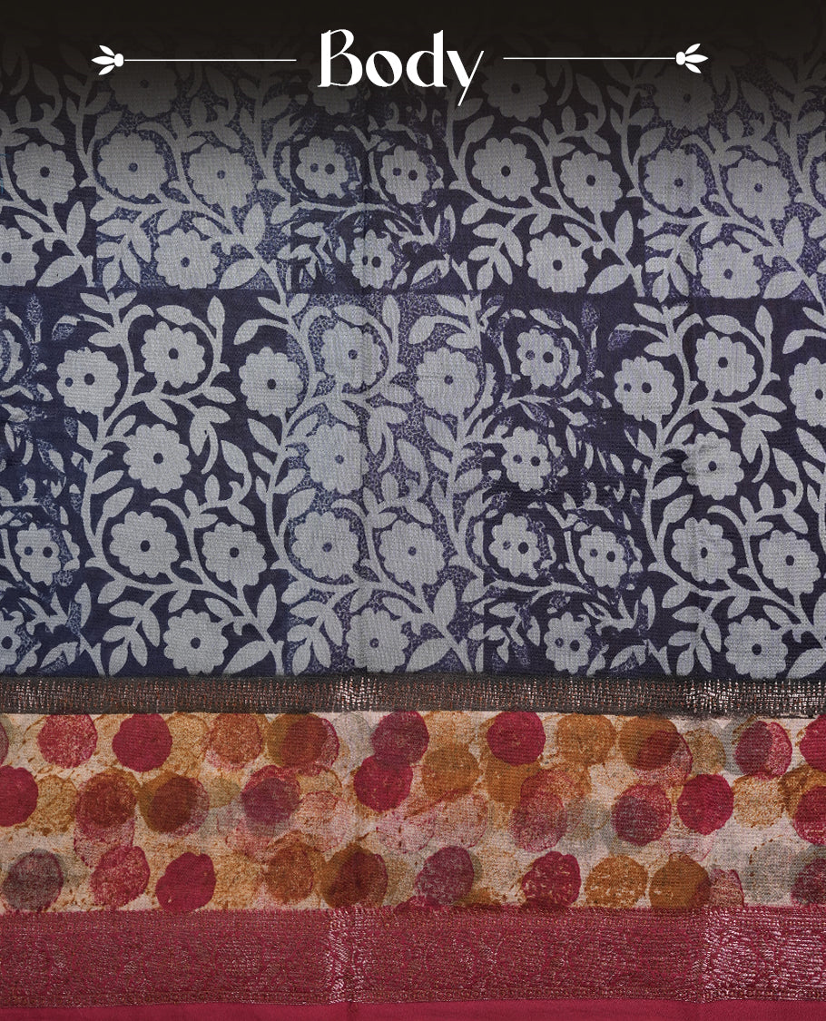 Dark blue colour chanderi silk saree featuring floral kodi print pattern across body, with contrast red colour border with zair pattern and paired with matching blouse.