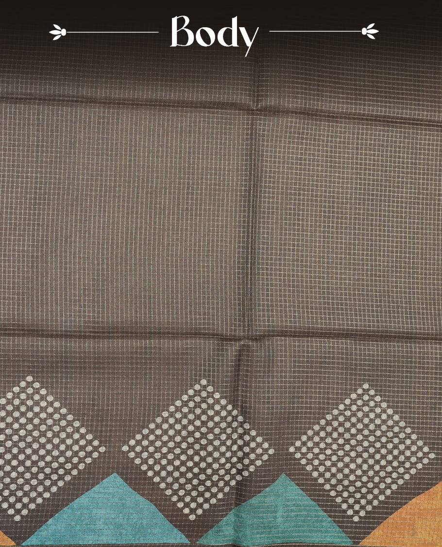 Charcoal Brown colour semi tussar silk saree crafted in breathable cotton, featuring subtle striped textures across the body, a minimalist pallu with fine linear detailing, and a coordinated plain blouse piece.