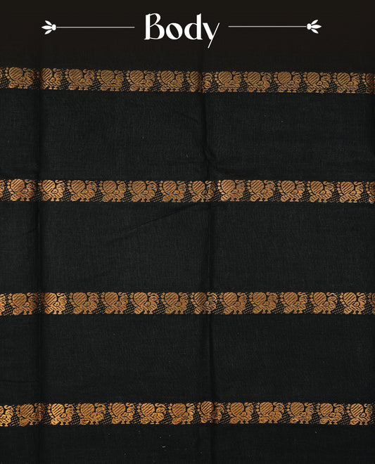 Black  Colour Sungudi Cotton Saree with peacock gold zari stripes on the body, a matching gold zari border, and a striped gold zari pallu. Paired with a contrast coffee brown blouse featuring gold zari work.