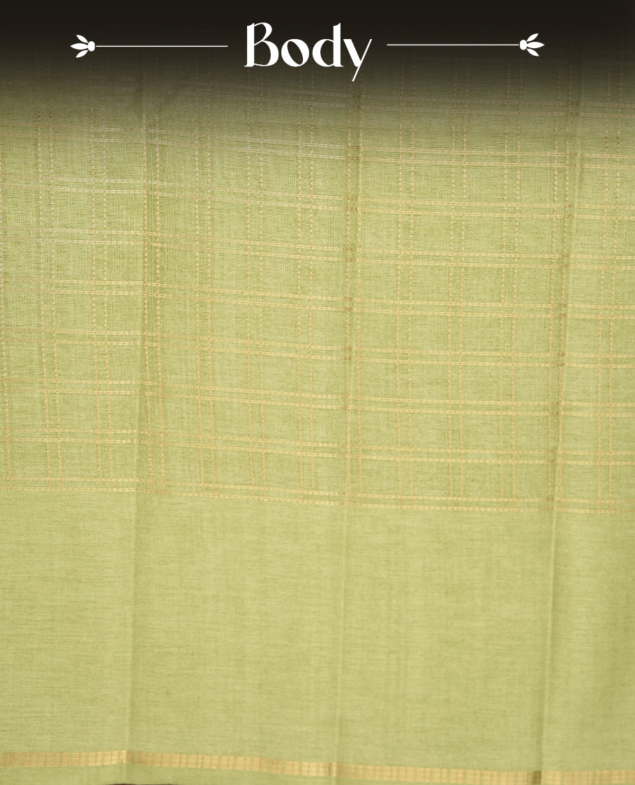 Pastel green colour semi tussar silk saree highlights gold zari check pattern across body,  border, pallu and paired with matching blouse piece.