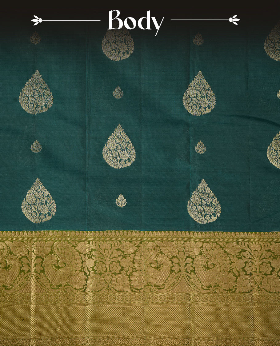 Teal colour soft silk saree featuring gold zari motifs on the body, complemented by a contrast Green traditional zari border and pallu, paired with matching blouse piece.