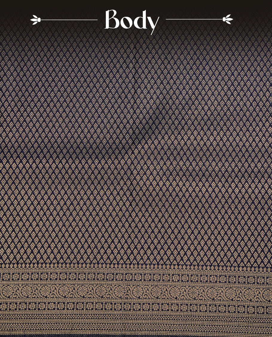 Navy Blue colour soft silk saree featuring gold zari pattern on body, complemented by self colour with traditional border, paired with matching blouse piece.