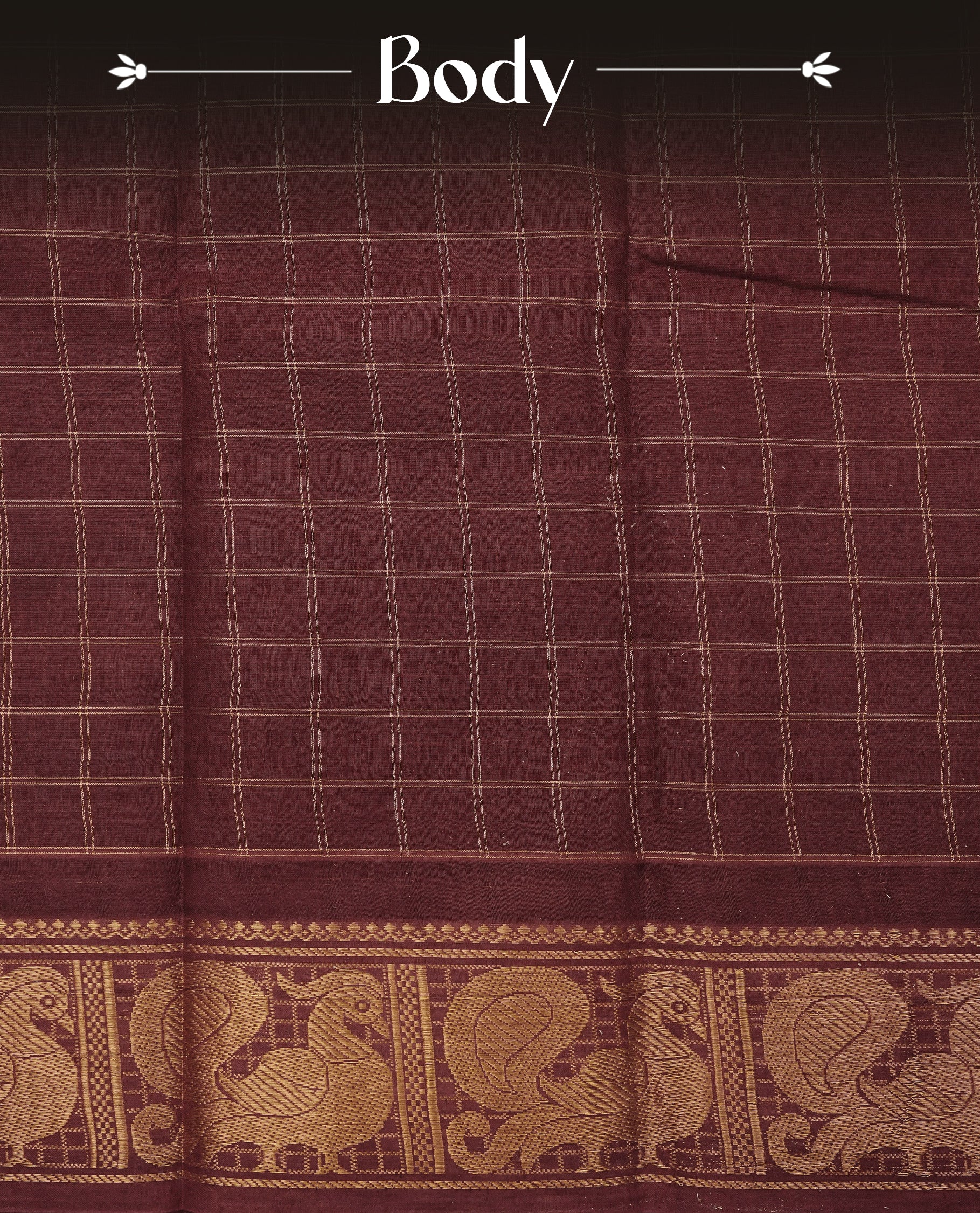 Maroon Sungudi cotton saree featuring elegant gold zari checks across the body, complemented by a rich gold zari peacock border. Paired with a matching blouse piece