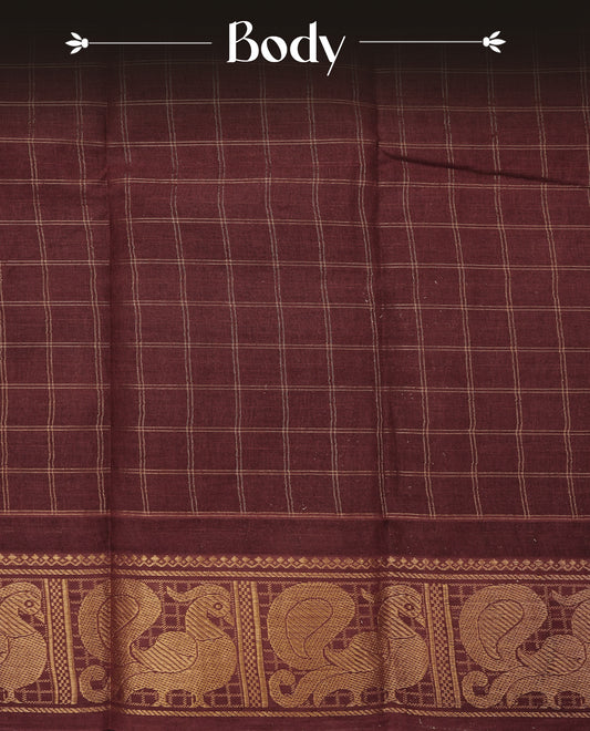 Maroon Sungudi cotton saree featuring elegant gold zari checks across the body, complemented by a rich gold zari peacock border. Paired with a matching blouse piece