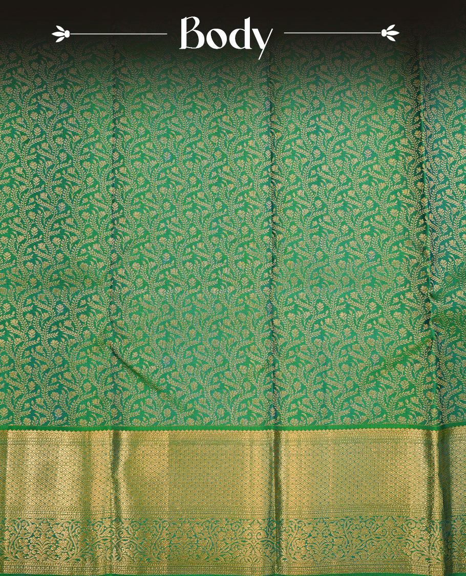 Green colour kancheepuram silk saree featuring gold zari floral kodi pattern on body, complemented by self colour with traditional border, paired with matching blouse piece.